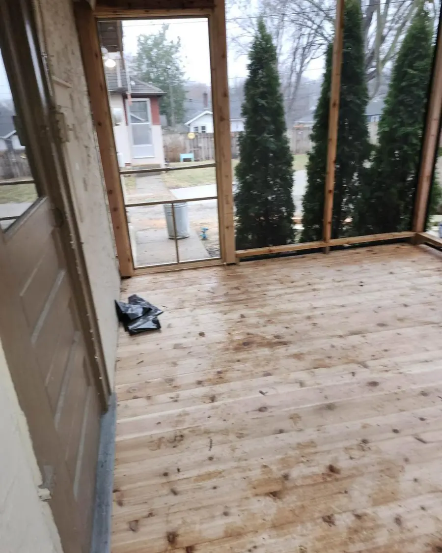 New cedar deck boards in the screened porch