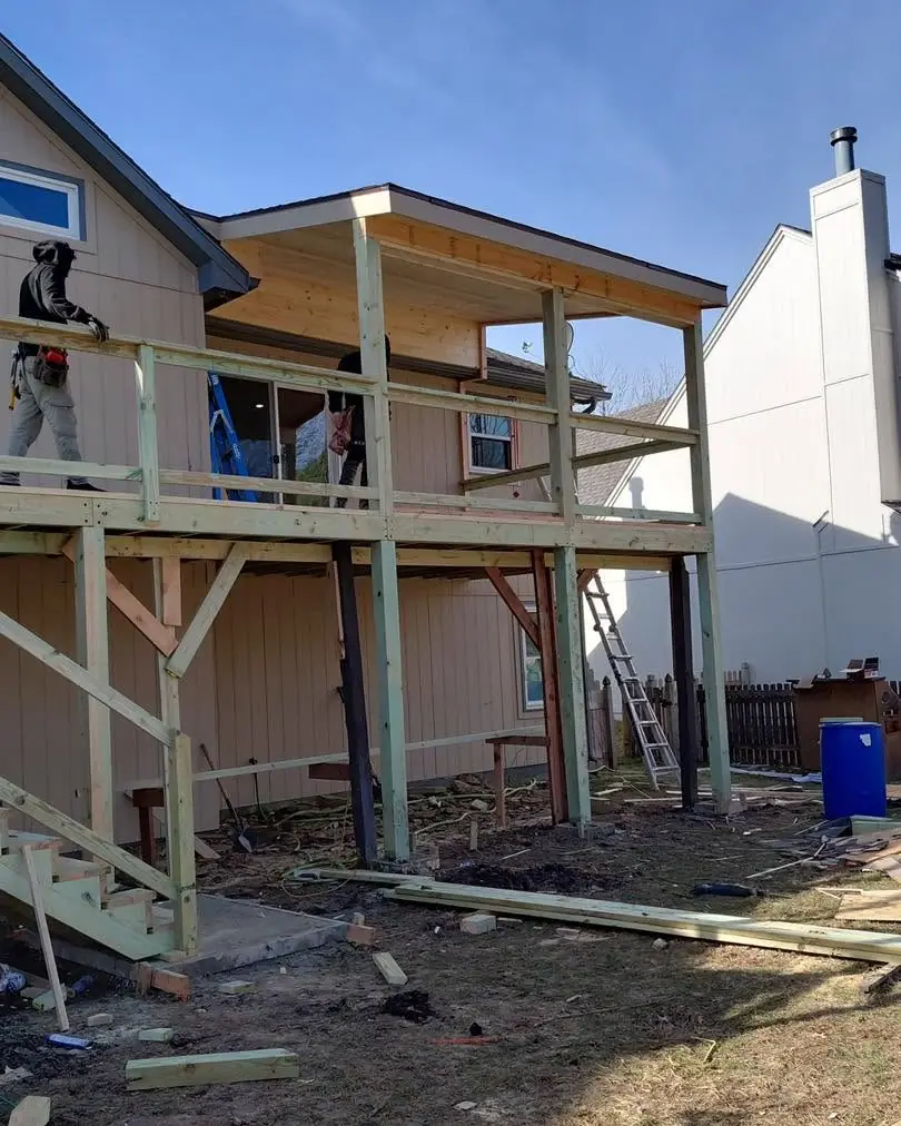 Deck posts and joists during a KC Deck Services build